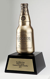 A photo of a Modelo's award for one million cases sold.